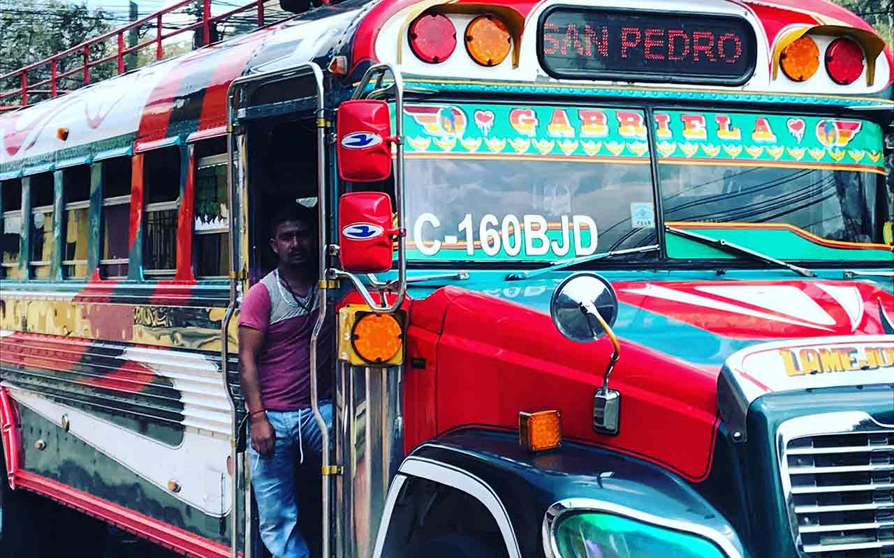 Repurposed buses are common modes of transport in Guatemala
