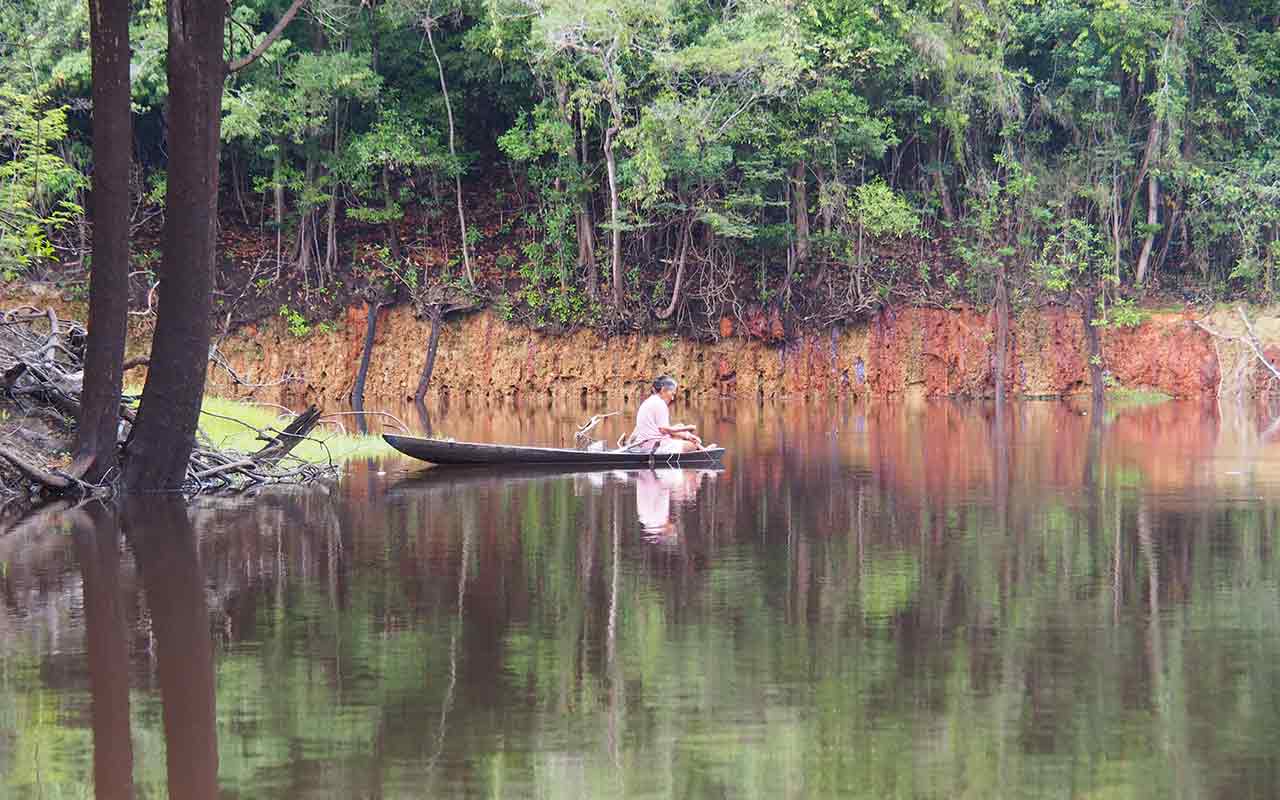 A woman at Tupana River in the Amazonian jungle of Brazil