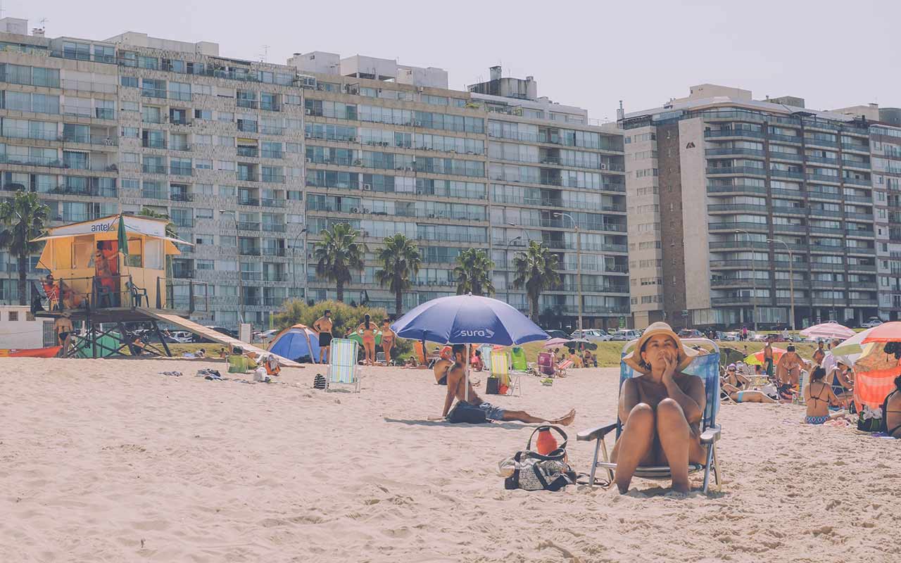 A tourist in Montevideo keeps her belongings close to here while in a public place
