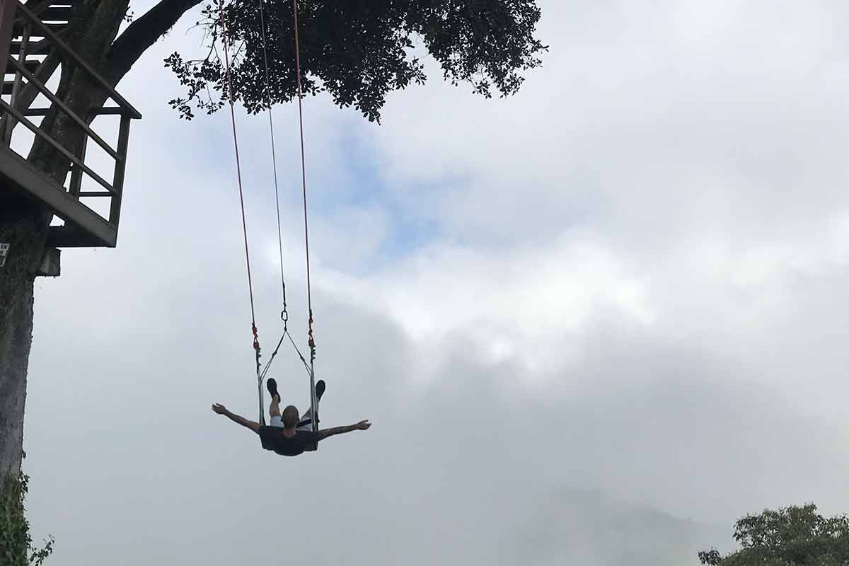 rope swing banos ecuador travel